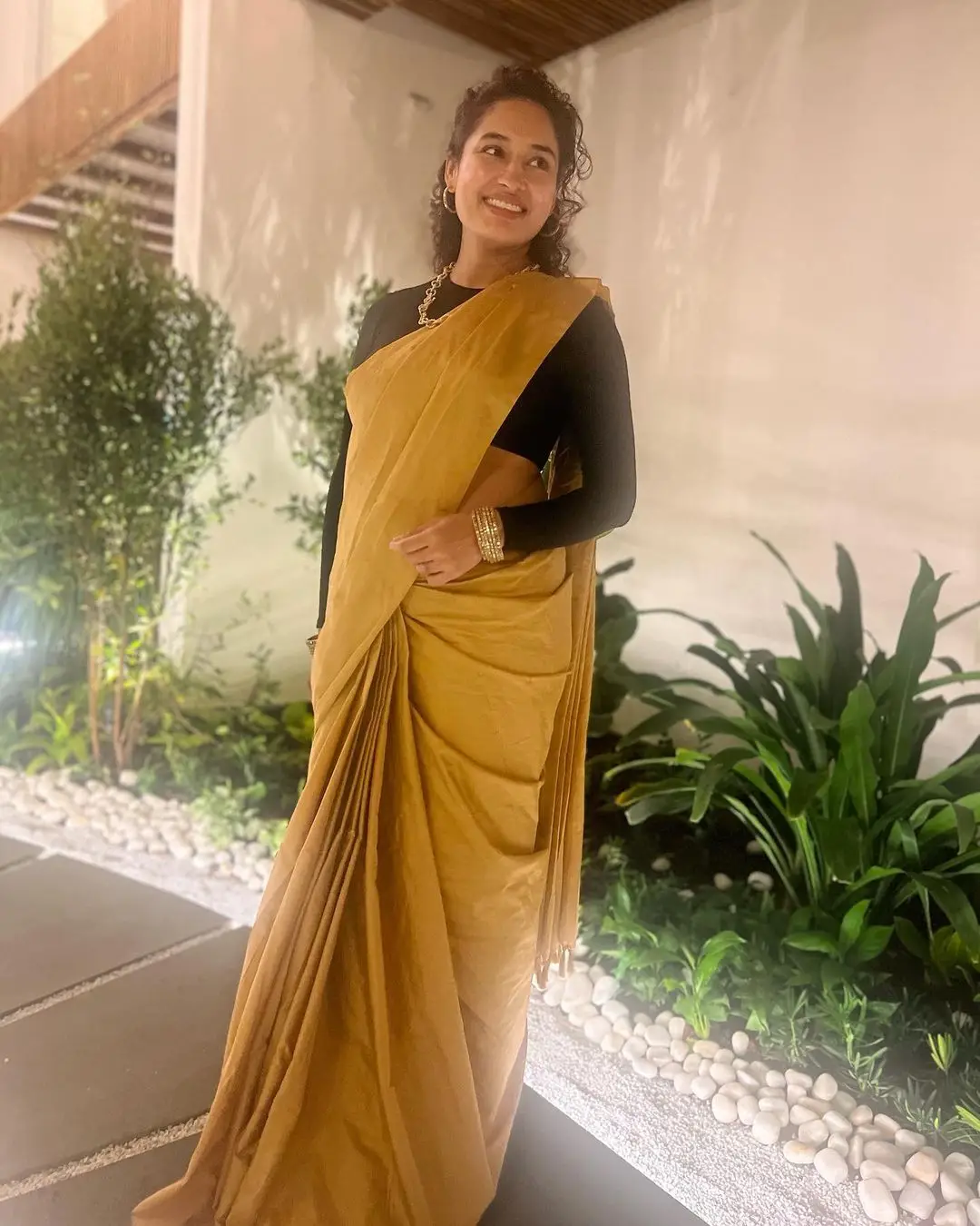 Pooja Ramachandran Stills in Yellow Saree Black Blouse